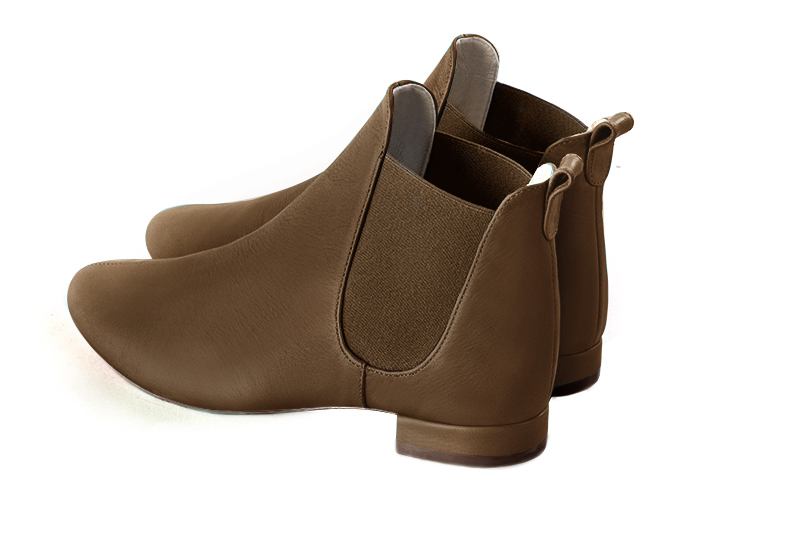 Caramel brown women's ankle boots, with elastics. Round toe. Flat block heels. Rear view - Florence KOOIJMAN